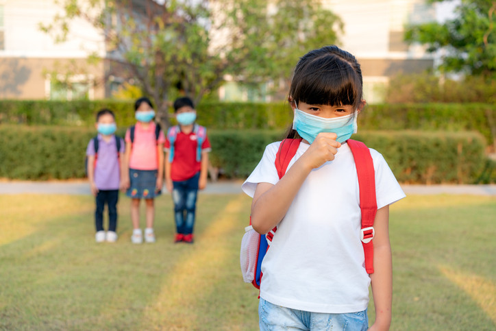 girl wearing mask back to school